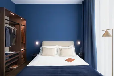 Letto o letti in una camera di Cavour Deluxe by Mmega