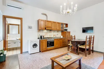 Cucina o angolo cottura di GuestHost - The Country in the City - Parco delle Cascine Apartments