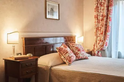 Letto o letti in una camera di Locanda De' Ciompi
