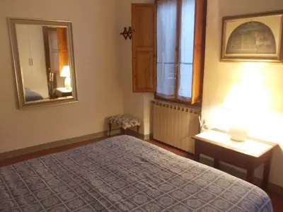Letto o letti in una camera di Appartamento del Campuccio
