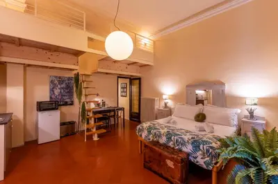 Letto o letti in una camera di Secret Garden Firenze B&B