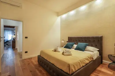 Letto o letti in una camera di Signoria Stylish Suite in Florence