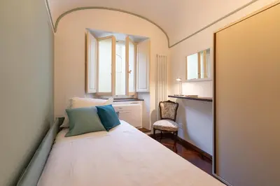 Letto o letti in una camera di Lungarno Vespucci Apartment by Charming Italy Tour