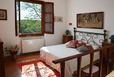 Letto o letti in una camera di Poggio Borgoni