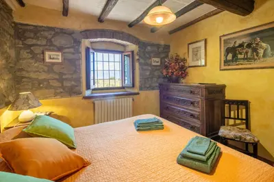 Letto o letti in una camera di Casa Rebecca by VacaVilla