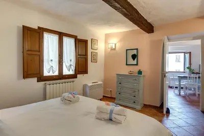Letto o letti in una camera di Toscanella Apartment by Mamo Florence