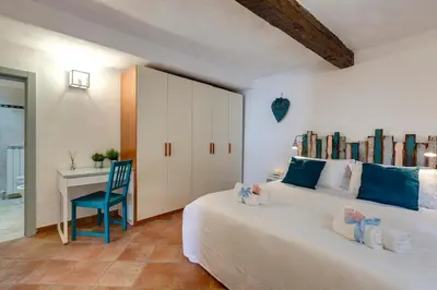 Letto o letti in una camera di Toscanella Apartment by Mamo Florence