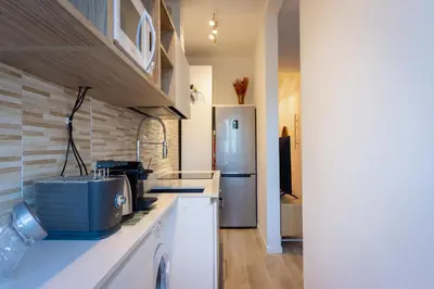 Cucina o angolo cottura di Mosse Leopolda Apartment by Mamo Florence