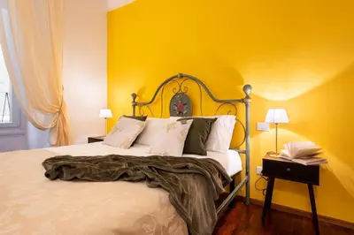 Letto o letti in una camera di Signoria - Flo Apartments