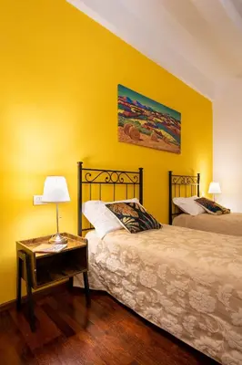 Letto o letti in una camera di Signoria - Flo Apartments