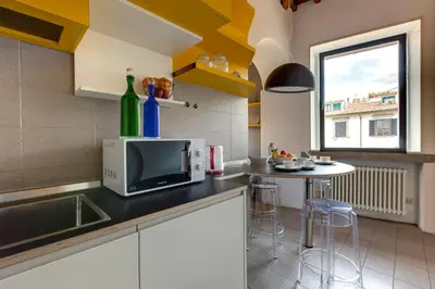 Cucina o angolo cottura di Beatrice Apartment by Mamo Florence