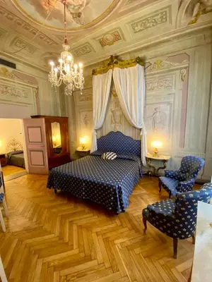 Letto o letti in una camera di Hotel Martelli