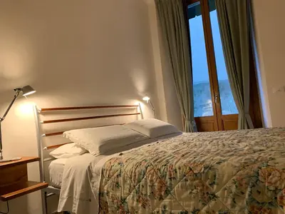 Letto o letti in una camera di A casa di Enrico e LuzMe
