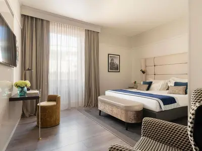 Letto o letti in una camera di Cerretani Hotel Firenze - MGallery Collection