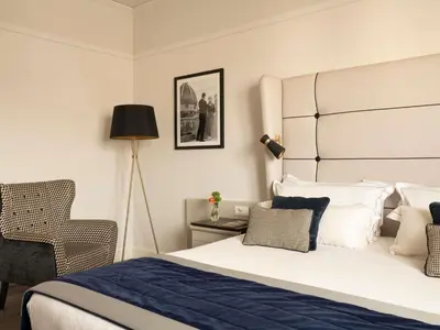 Letto o letti in una camera di Cerretani Hotel Firenze - MGallery Collection