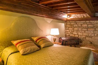 Letto o letti in una camera di Fattoria Il Milione Agriturismo