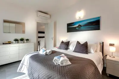 Letto o letti in una camera di Alamanni Apartment by Mamo Florence