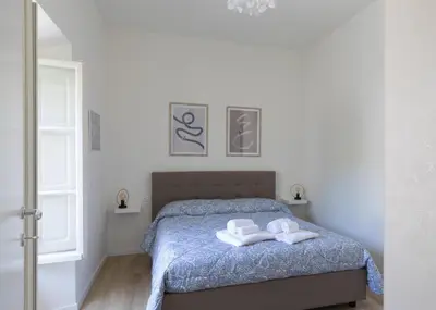 Letto o letti in una camera di Otello Suite - Brand new flat Santa Maria Novella