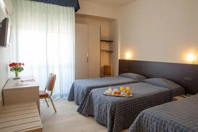 Letto o letti in una camera di AUTO PARK Hotel