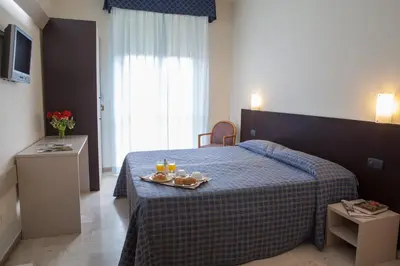 Letto o letti in una camera di AUTO PARK Hotel