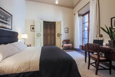 Letto o letti in una camera di Apartments Florence - The Slowcoach House