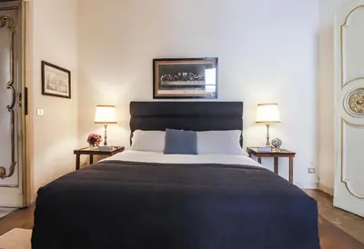 Letto o letti in una camera di Apartments Florence - The Slowcoach House