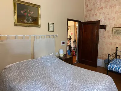 Letto o letti in una camera di LA BARRIERA UNO