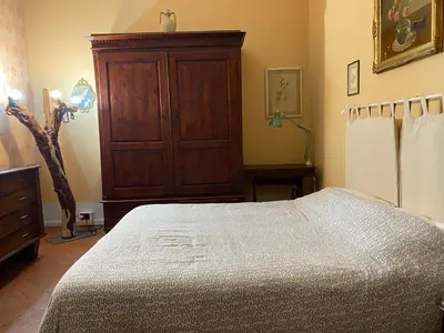 Letto o letti in una camera di LA BARRIERA UNO