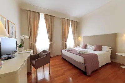 Letto o letti in una camera di Residence Hilda