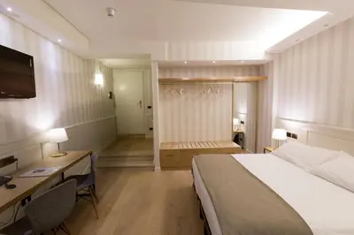 Letto o letti in una camera di Hotel Silla