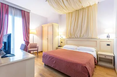 Letto o letti in una camera di West Florence