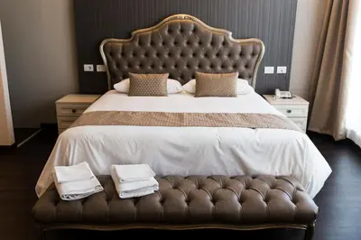 Letto o letti in una camera di Hotel Datini