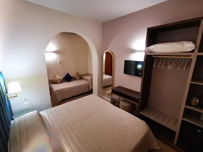 Letto o letti in una camera di Hotel Balcony