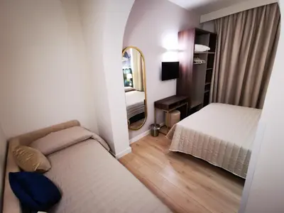 Letto o letti in una camera di Hotel Balcony
