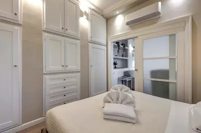 Letto o letti in una camera di ISIDORO Apartment
