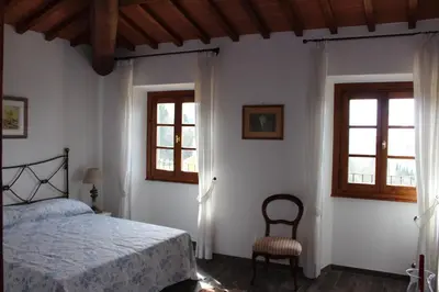 Letto o letti in una camera di Art Apartment Chianti Family
