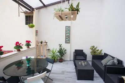 Area soggiorno di Orsini Family Deluxe Apartment by Mamo Florence
