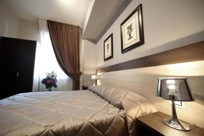 Letto o letti in una camera di FLORENCE ROOMS67