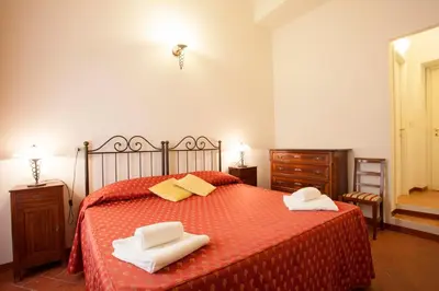 Letto o letti in una camera di B&B Home in Florence