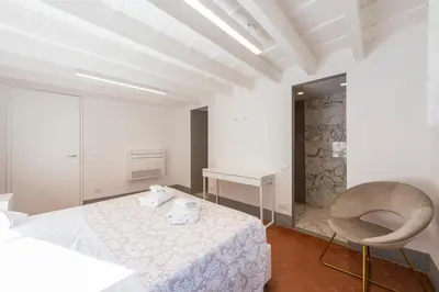 Letto o letti in una camera di Santo Spirito View by Mmega