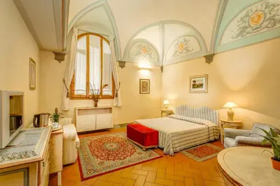 Letto o letti in una camera di Firenze Suite
