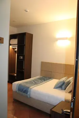 Letto o letti in una camera di Hotel Marzia