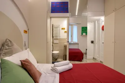 Letto o letti in una camera di La Chicca Pontevecchio