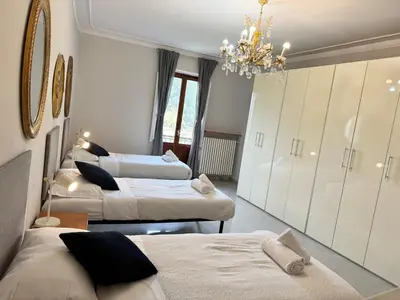 Letto o letti in una camera di Magnoli 2 D