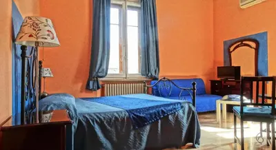 Letto o letti in una camera di Affittacamere Belfiore