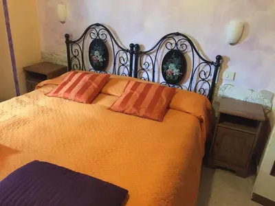 Letto o letti in una camera di Affittacamere Belfiore