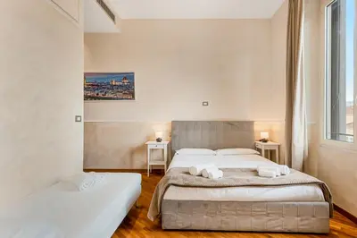 Letto o letti in una camera di Medici Apartment