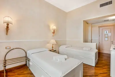 Letto o letti in una camera di Medici Apartment