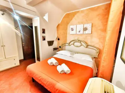 Letto o letti in una camera di Appartamento Stella in centro a Firenze