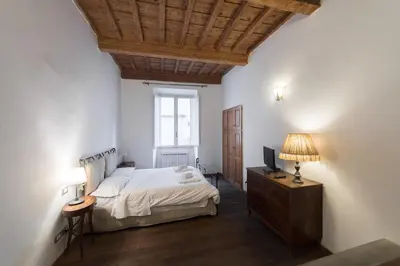Letto o letti in una camera di Bilo in Piazza della Passera, Florence
